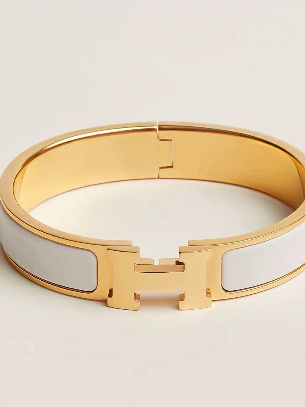 Hermès Clic H Enamel Bangle in White and Gold